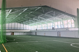 北海道紋別市の旧道都大学体育館を人工芝屋内練習場へ改修